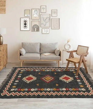 Handmade Southwestern Wool Jute Kilim Area Rug with Tassels | Black Tribal Boho Flatweave Rug for Living Room & Bedroom