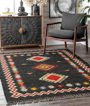 Handmade Southwestern Wool Jute Kilim Area Rug with Tassels | Black Tribal Boho Flatweave Rug for Living Room & Bedroom
