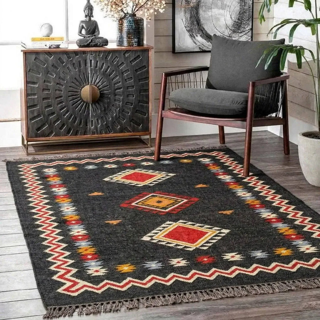 Handmade Southwestern Wool Jute Kilim Area Rug with Tassels | Black Tribal Boho Flatweave Rug for Living Room & Bedroom