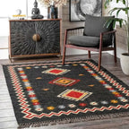 Handmade Southwestern Wool Jute Kilim Area Rug with Tassels | Black Tribal Boho Flatweave Rug for Living Room & Bedroom