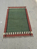 Handwoven Olive Green Wool Jute Kilim Rug, Handmade Flatweave Area Rug, Rustic Boho Dhurrie Carpet, Minimalist Natural Fiber Rug with Fringe