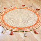 Natural Jute Circle Rug with Rust Stripes – Hand-Braided Tasselled Carpet