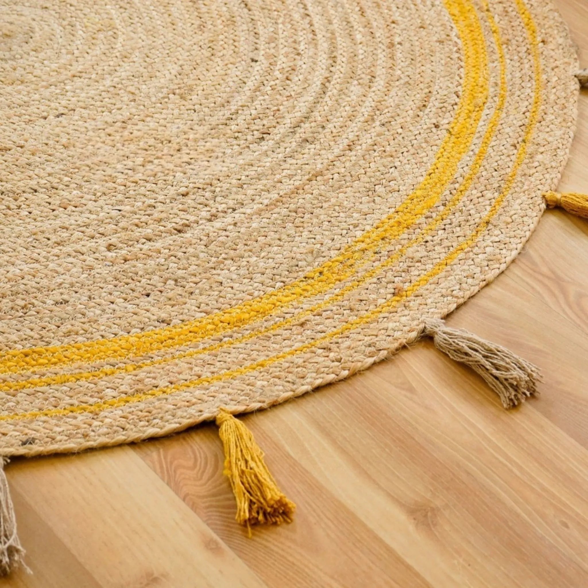 Natural Jute Circle Rug with Golden Stripes – Hand-Braided Tasselled Carpet
