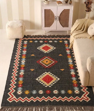 Handmade Southwestern Wool Jute Kilim Area Rug with Tassels | Black Tribal Boho Flatweave Rug for Living Room & Bedroom