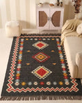 Handmade Southwestern Wool Jute Kilim Area Rug with Tassels | Black Tribal Boho Flatweave Rug for Living Room & Bedroom