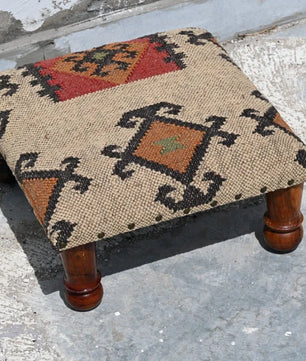 Handmade Geometric Kilim Footstool – Beige Upholstered Ottoman with Turned Wooden Legs